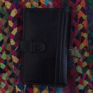 Brown leather wallet/ phone case for standard iPhone.